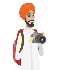 Image showing Hindu nature photographer with digital camera.