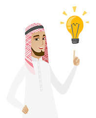 Image showing Muslim businessman pointing at business idea bulb.