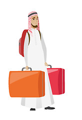 Image showing Disappointed tourist holding two big suitcases.