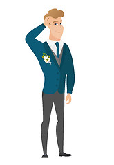 Image showing Young caucasian groom scratching his head.