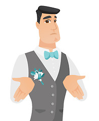 Image showing Young caucasian confused groom shrugging shoulders