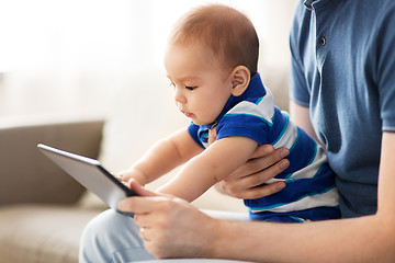 Image showing baby and father with tablet pc at home