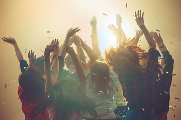 Image showing Nightlife and disco concept. Young people are dancing in club.