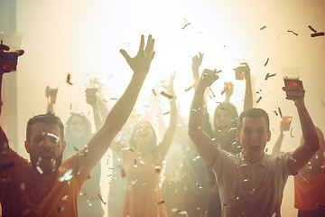 Image showing Nightlife and disco concept. Young people are dancing in club.