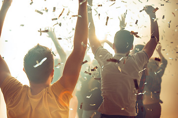 Image showing Nightlife and disco concept. Young people are dancing in club.