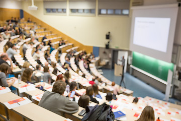 Image showing Defocused image of audience at the conference hall during academic lecture.