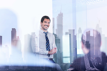 Image showing Confident company leader on business meeting against new york city manhattan buildings and skyscrapers window reflection.