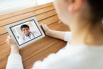 Image showing patient having video chat with doctor on tablet pc