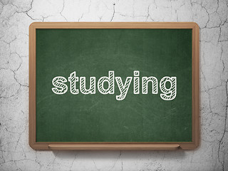 Image showing Education concept: Studying on chalkboard background
