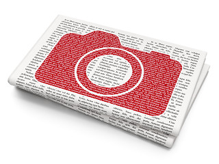 Image showing Travel concept: Photo Camera on Newspaper background