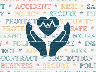 Image showing Insurance concept: Heart And Palm on wall background