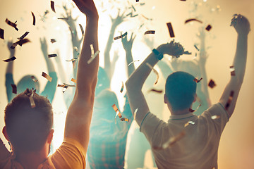 Image showing Nightlife and disco concept. Young people are dancing in club.