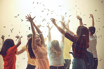 Image showing Nightlife and disco concept. Young people are dancing in club.