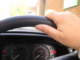 Image showing hand on wheel