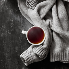 Image showing knitted sweater with to cup of tea