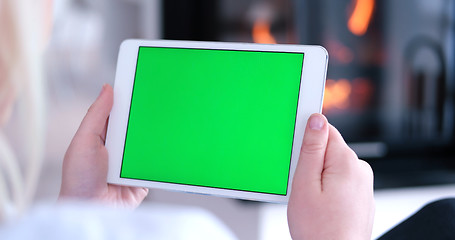 Image showing woman on sofa using tablet computer