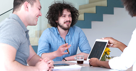 Image showing Multiethnic startup business team on meeting