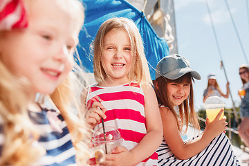 Image showing The children on board of sea yacht