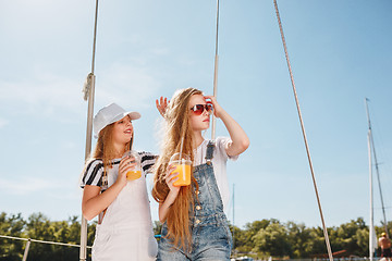 Image showing The children on board of sea yacht