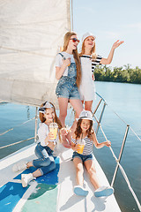 Image showing The children on board of sea yacht