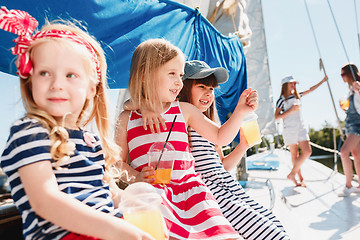 Image showing The children on board of sea yacht