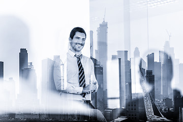 Image showing Confident company leader on business meeting against new york city manhattan buildings and skyscrapers window reflections.