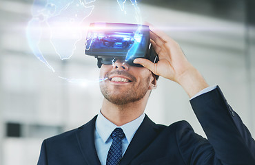 Image showing businessman with virtual reality headset at office