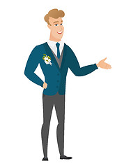 Image showing Groom with arm out in a welcoming gesture.