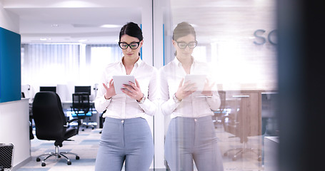 Image showing Business Woman Using Digital Tablet in front of Office