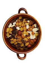 Image showing mix of raisins and different nuts in a bowl on a white 