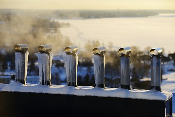 Image showing ventilation pipes on the roof of the house