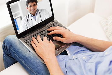 Image showing patient having video chat with doctor on laptop