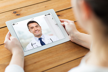 Image showing patient having video chat with doctor on tablet pc