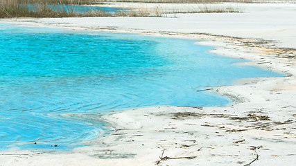 Image showing Natural Background With Turquoise Lake Among The White Sand