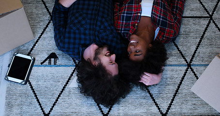 Image showing Top view of attractive young multiethnic couple