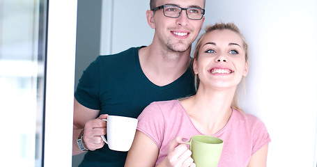 Image showing young couple enjoying morning coffee