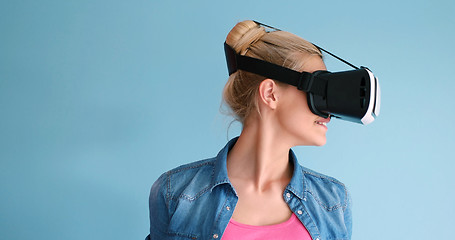 Image showing woman using VR headset glasses of virtual reality