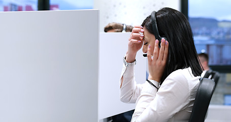 Image showing female call centre operator doing her job