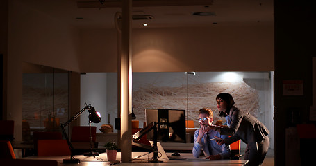 Image showing young designers in the night office