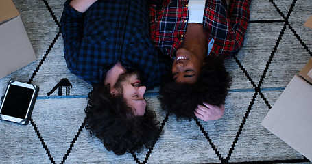 Image showing Top view of attractive young multiethnic couple