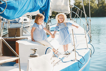 Image showing The children on board of sea yacht
