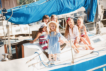 Image showing The children on board of sea yacht