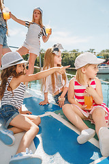 Image showing The children on board of sea yacht