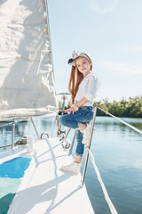 Image showing The children on board of sea yacht