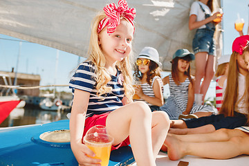 Image showing The children on board of sea yacht