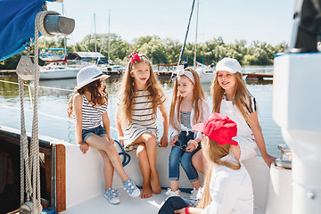 Image showing The children on board of sea yacht