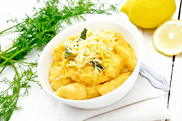 Image showing Gnocchi pumpkin in bowl on light board