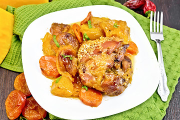 Image showing Chicken roast with pumpkin and carrots on green towel
