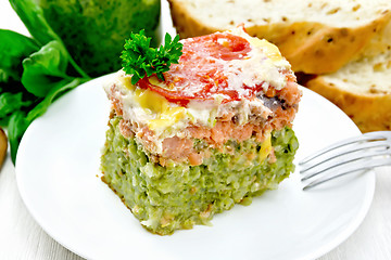 Image showing Casserole of salmon and rice on white board