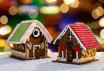 Image showing gingerbread houses over christmas lights
